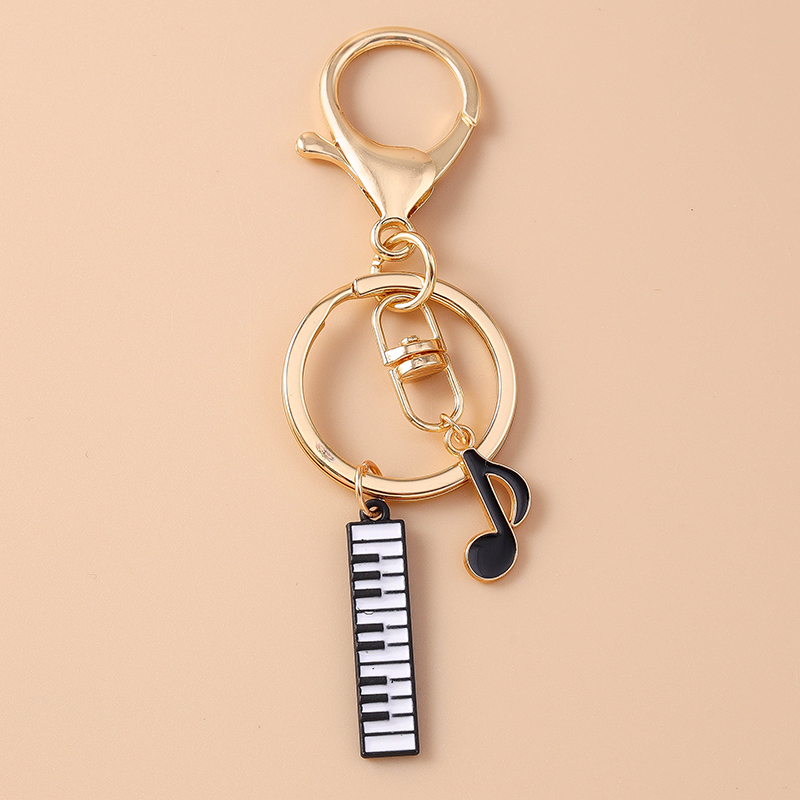 Cute Enamel Mini Piano Keychai - Musical Instrument Tabla review and price