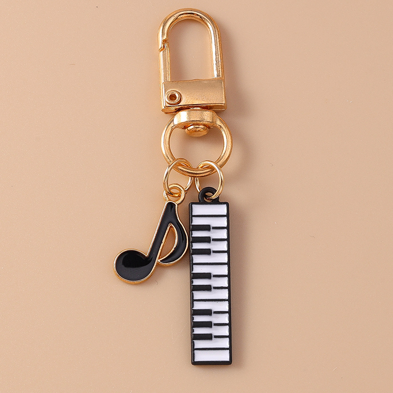 Cute Enamel Mini Piano Keychai - Musical Instrument Tabla review and price